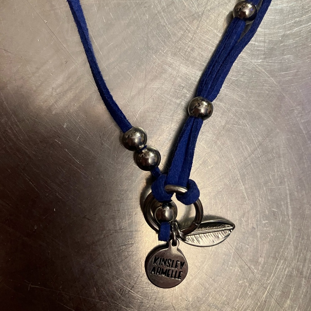 Two Kinsley Armelle wrap bracelets, they seem to be suede but not entirely sure.